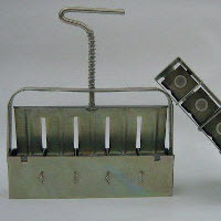 [12-008920] Presse galvanisée pour pots - 5 pots de 38 mm